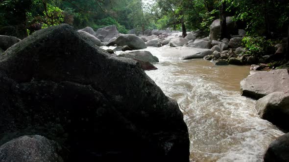 Revealing scene beautiful landscape rocky rainforest river in Thailand