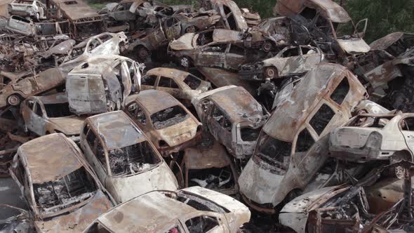 War in Ukraine a Dump of Burned Cars in Irpin Bucha District