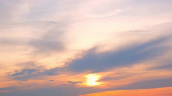 4K UHD : Time lapse of colorful sky during beautiful sunset. Romantic clouds. Summer sky