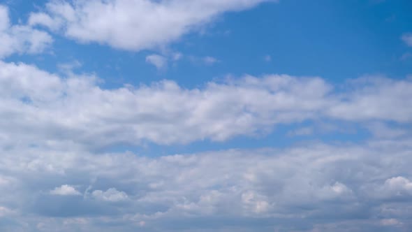 Cumulus Clouds Move in the Blue Sky Cloudscape Timelapse