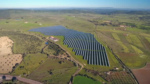 Aerial Top View of Solar Farm with Sunlight Cells for Producing Renewable Electricity