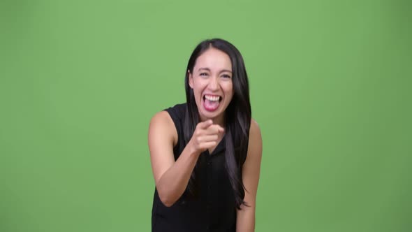 Young Beautiful Asian Businesswoman Laughing
