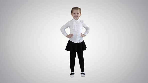 Little Girl Posing in Different Poses on Gradient Background