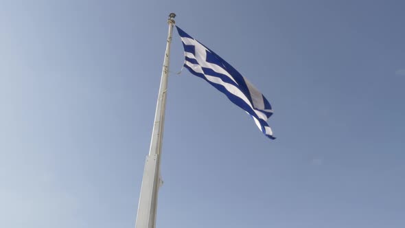 National flag of Greece against blue sky