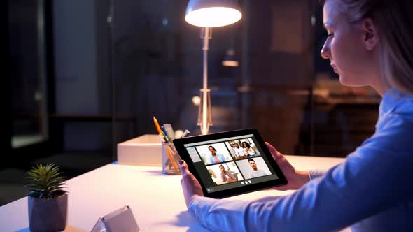 Businesswoman Having Video Chat at Night Office