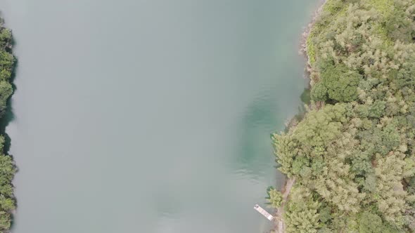 Ascending tilting camera view of Spectacular View of Feitsui Reservoir, Emerald lake, Thousand Islan