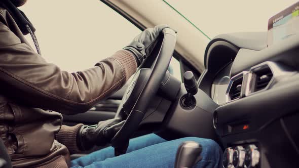 Man Rotating Steering Wheel.Driver On Car Vehicle.Hand On Car Steering Wheels. Man Driving Auto