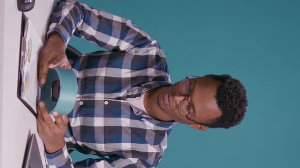 Vertical Video Punctual Man Checking Time on Wall Clock and Feeling Upset