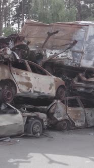 Vertical Video of a Dump of Destroyed Cars During the War in Ukraine