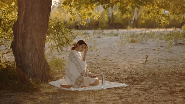 Woman in Autumn Park