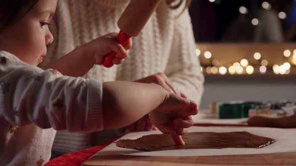 Mother and Daughter Making Gingerbread at Home