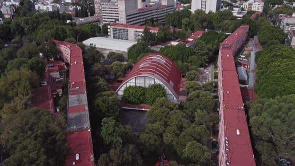 Reverse reveal drone view of a housing unit in Mexico City