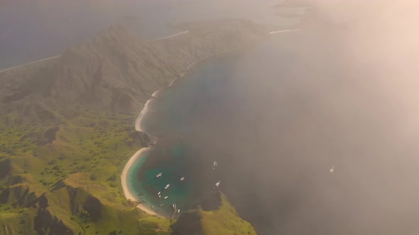 Scenic aerial view over the clouds of Padar islands during day, Indonesia.