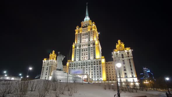 Hotel Ukraine Winter Night Timelapse Hyperlapse with Shevchenko Monument on Moscow River.