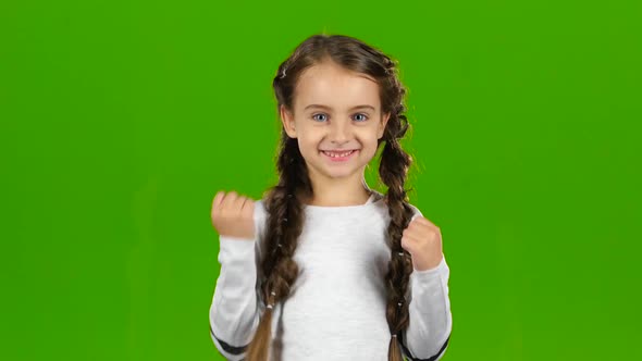 Child Rejoices in Victory. Green Screen