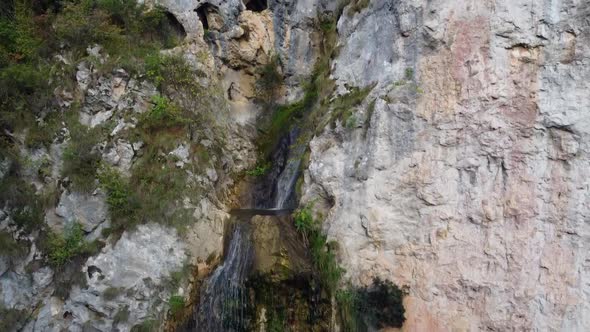Flight Up Drone Shot Of Vanatarile Ponorului Waterfall In Romania
