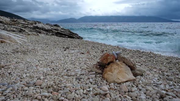 pebble stones beach and blue sea