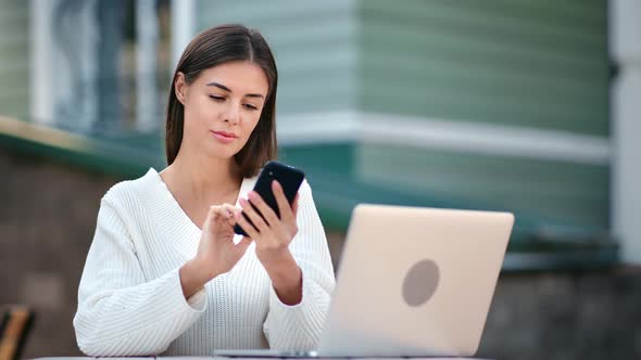 Happy Freelancer Female Chatting Use Mobile Enjoying Remotely Working Outdoor