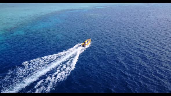 Aerial above tourism of marine resort beach wildlife by clear water with white sandy background of a