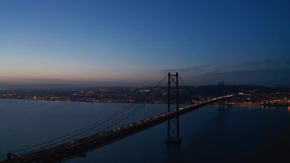 Night Aerial View of 25Th of April Bridge Connecting Lisbon and Almada