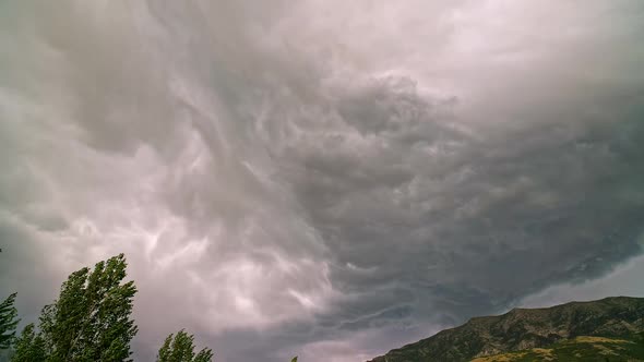 Storm clouds moving in timelapse over Cascade Mountain in Utah
