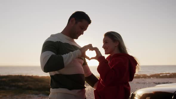 Couple in love enjoying free time on road trip together