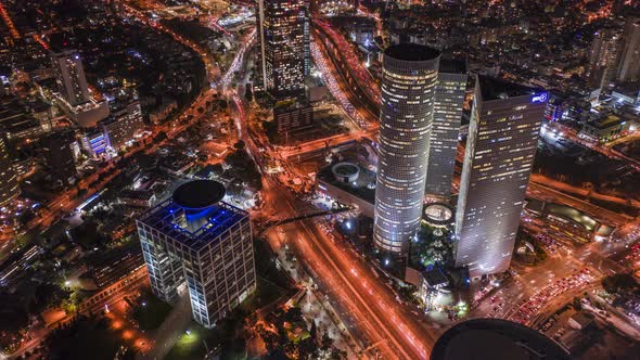 Night Tel Aviv business city center from birds view, Israel 4k aerial drone hyperlapse