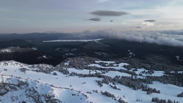 Panoramic aerial shot of valley from Oregon, USA, Crater Lake in the background