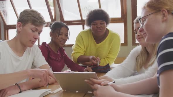 Students working together in high school class