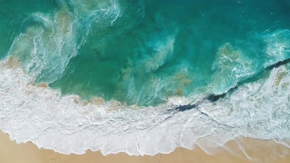 4K drone footage. Kelingking Beach in Nusa Penida, Bali, Indonesia.