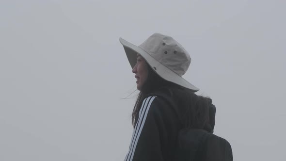 Young female tourist enjoying the view.