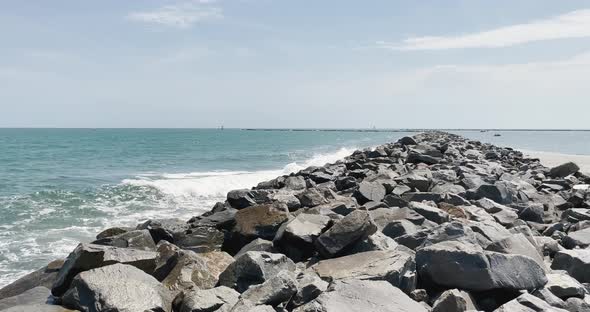 Ocean jetty with gentle waves