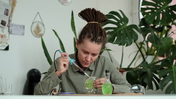 Woman Fixes Glass Plates