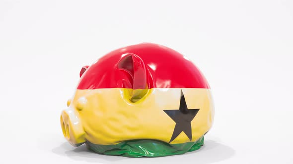 Deflating Piggy Bank with Printed Flag of Ghana