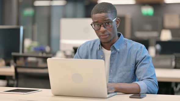 No Gesture with Finger By Young African American Man in Office