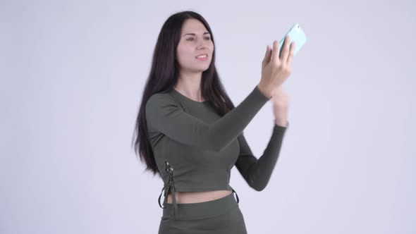 Happy Young Beautiful Woman Taking Selfie