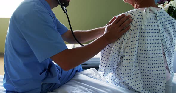 Nurse checking the patient with stethoscope