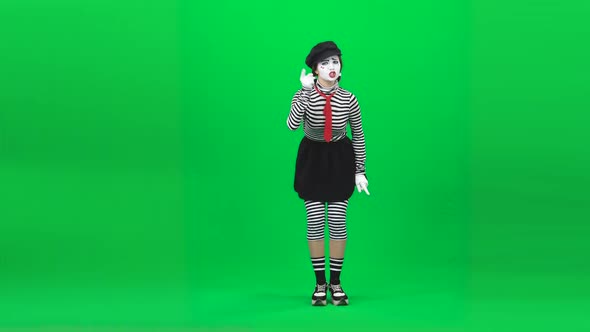 Mime Girl Scolding Someone, Showing Fist