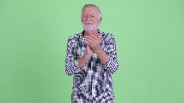 Happy Senior Bearded Man Clapping Hands