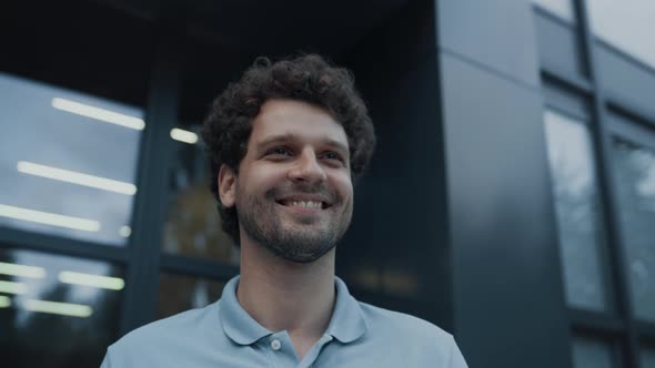 Portrait Smiling Man Posing at Modern Building