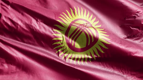 Kyrgyzstan textile flag waving on the wind. 10 seconds loop.