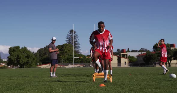 Rugby players training on the field