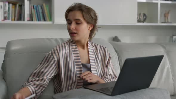 Freelancer Finishing Online Work on Weekend Closeup