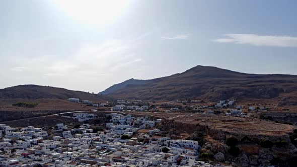 Rhdoes, Greece: Tilt down shot of white houses of Lindos town 