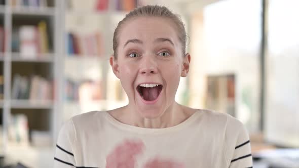 Portrait of Excited Young Woman Feeling Surprised 