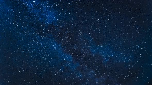 Time Lapse of moving milky way at night in summer alt