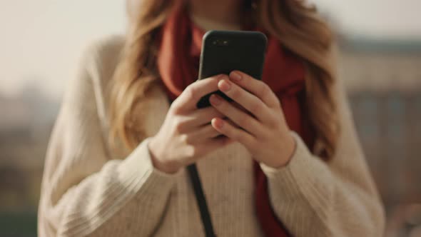 Closeup Woman Hands Using Phone Outdoors. Unrecognizable Girl Holding Cellphone