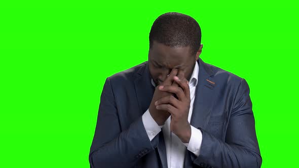 Unhappy Businessman Is Crying on Green Screen.