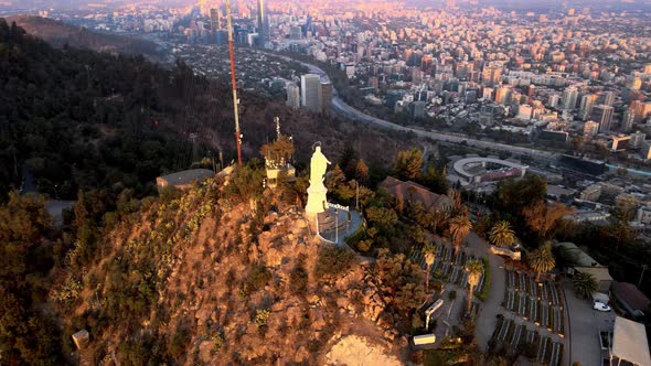 Aerial parallax of statue in Sanctuary of the Immaculate Conception in San Cristobal Hill top, Santi