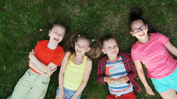 Group of Kids Lying on Grass